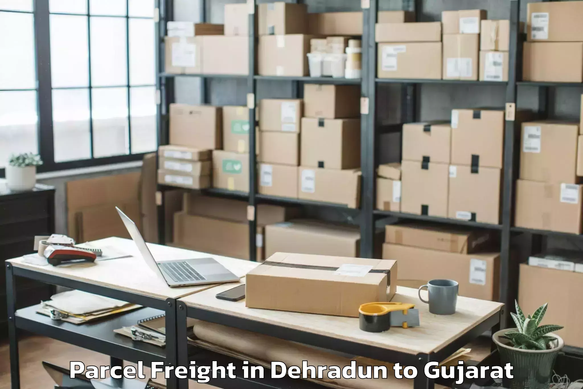 Quality Dehradun to Sardarkrushinagar Dantiwada Ag Parcel Freight